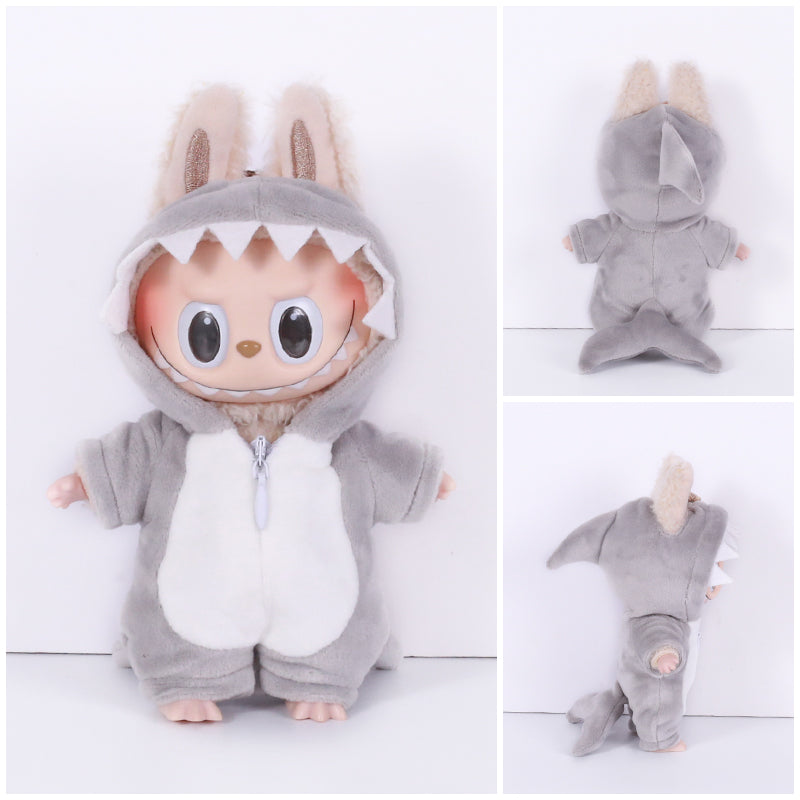 Labubu toy dressed in shark onesie